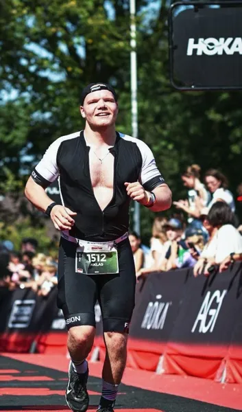 Niklas finishing triathlon