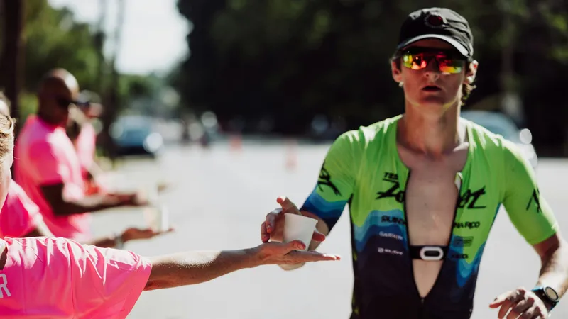 Runner handing drink